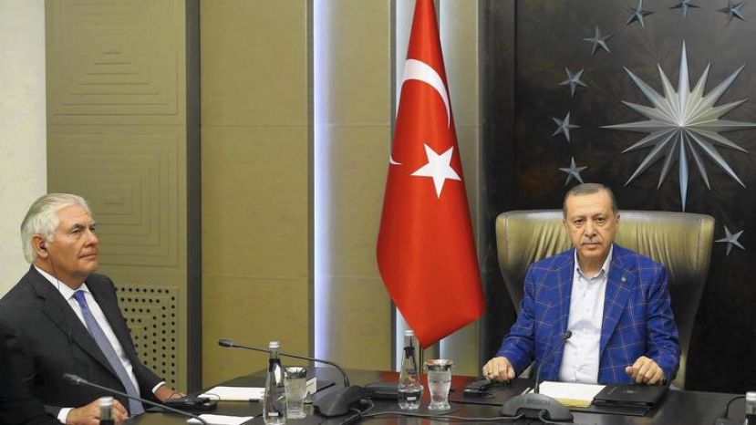 Turkey’s President Recep Tayyip Erdogan (right) meets July 9 with Secretary of State Rex Tillerson in Istanbul.