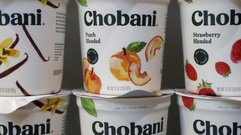 In this Monday, Nov. 20, 2017 photo, Chobani yogurt cups are displayed in New York. Chobani, the company that helped kick-start the Greek yogurt craze, is shrinking those words from its label as it hints it may expand beyond that food in an increasingly crowded yogurt market.